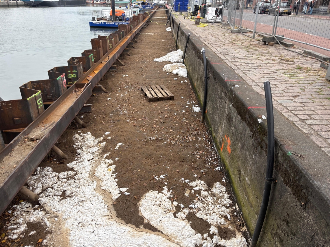 Pipes pre-installed along the wall.