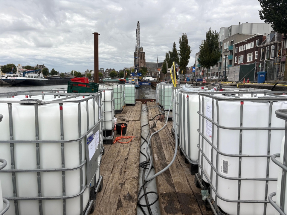 IBC's loaded onto the pontoon for easier access to the wharf wall.